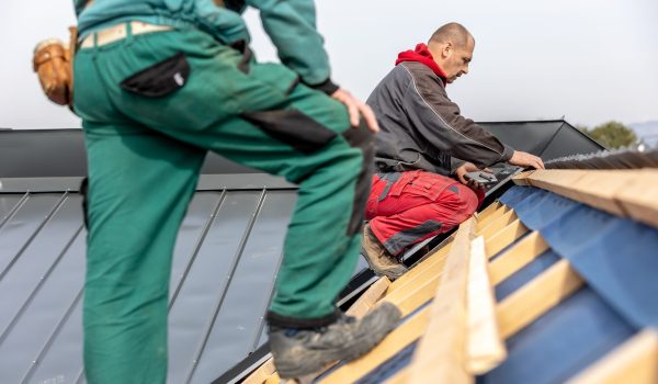 man-working-roof-with-drill